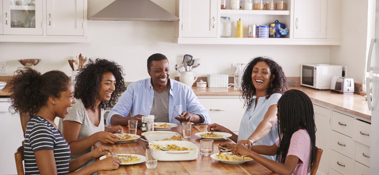 Black family at dinner table
